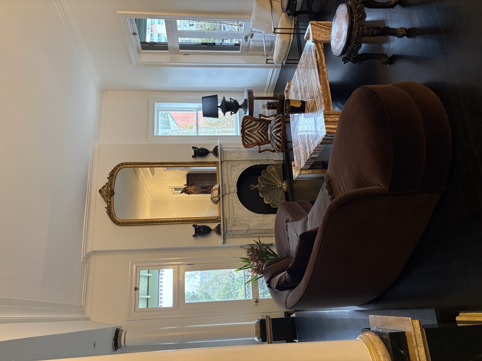 Ornate gold mirror mounted above fireplace, Top Notch Handyman Service